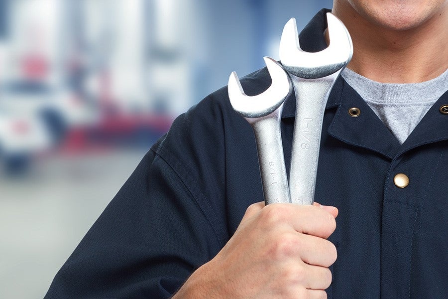 Service Technician Holding a Wrench